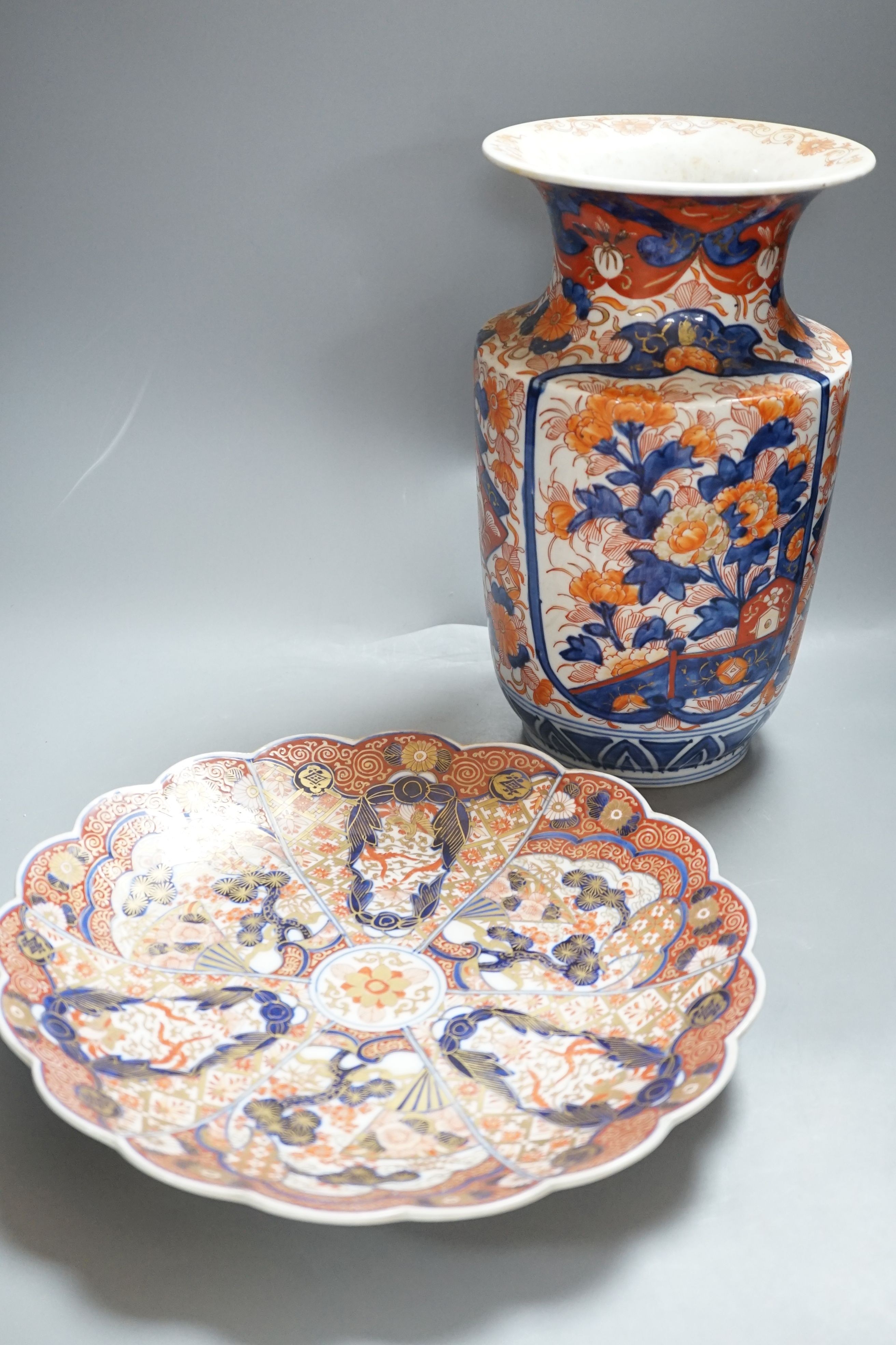 A Japanese Imari vase, 31cm tall, and an Imari dish, both Meiji period